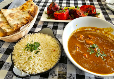 Desi Kitchen signature dishes Chicken Tikka Masala
Goat Biryani
Aloo Tikki Chaat